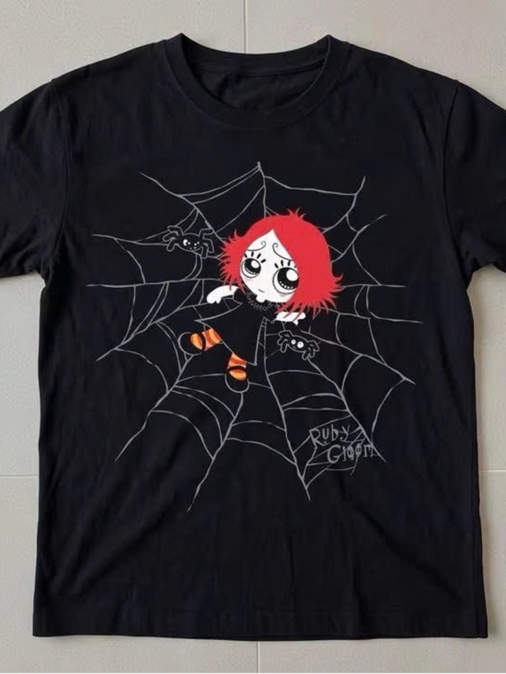 Black Short-Sleeve Tee with Red-Haired Character Graphic